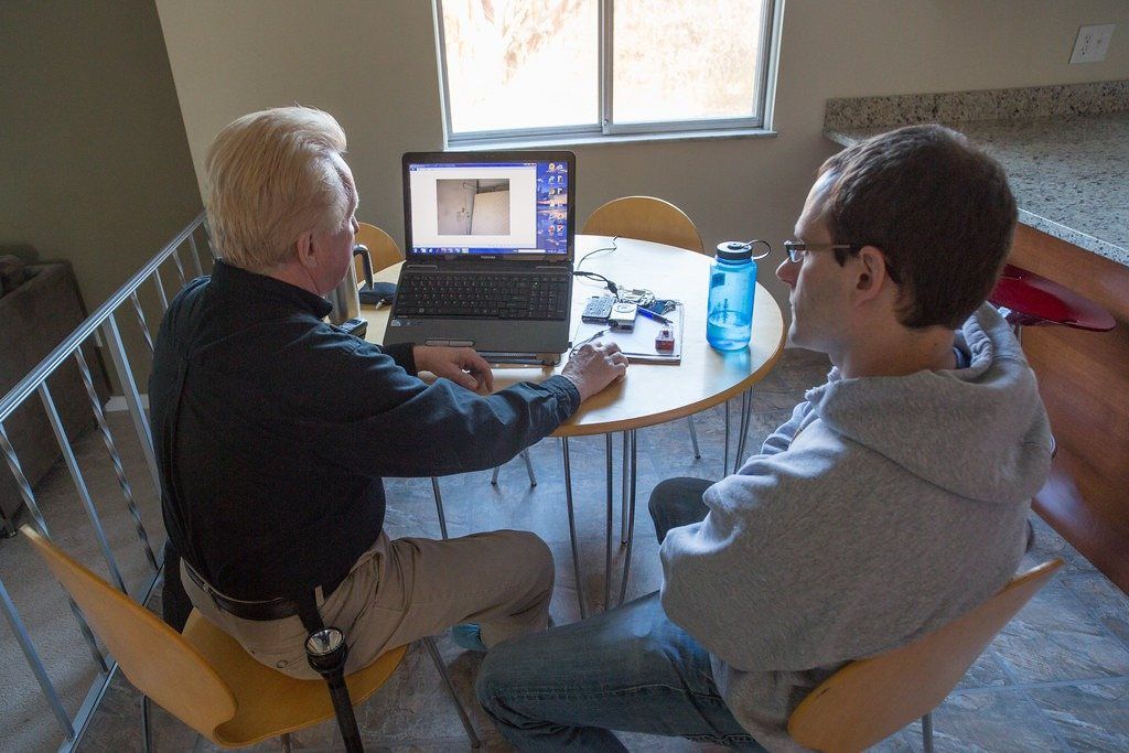 Homeowner reviewing documents with an advisor