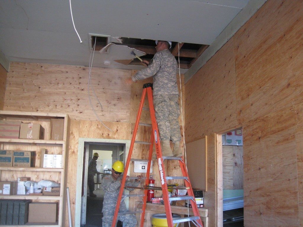Construction crew working on interior framing
