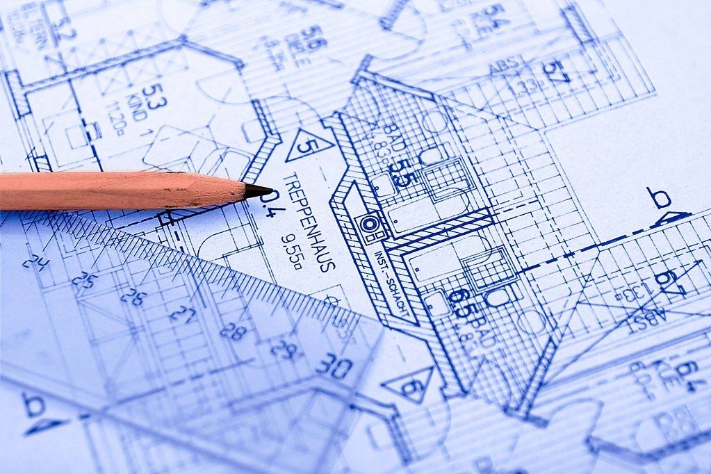 Architectural plans with drafting tools