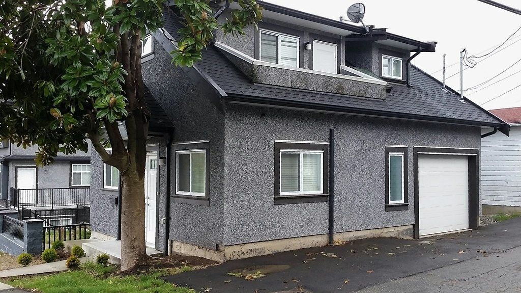 Two-story laneway house with a garage